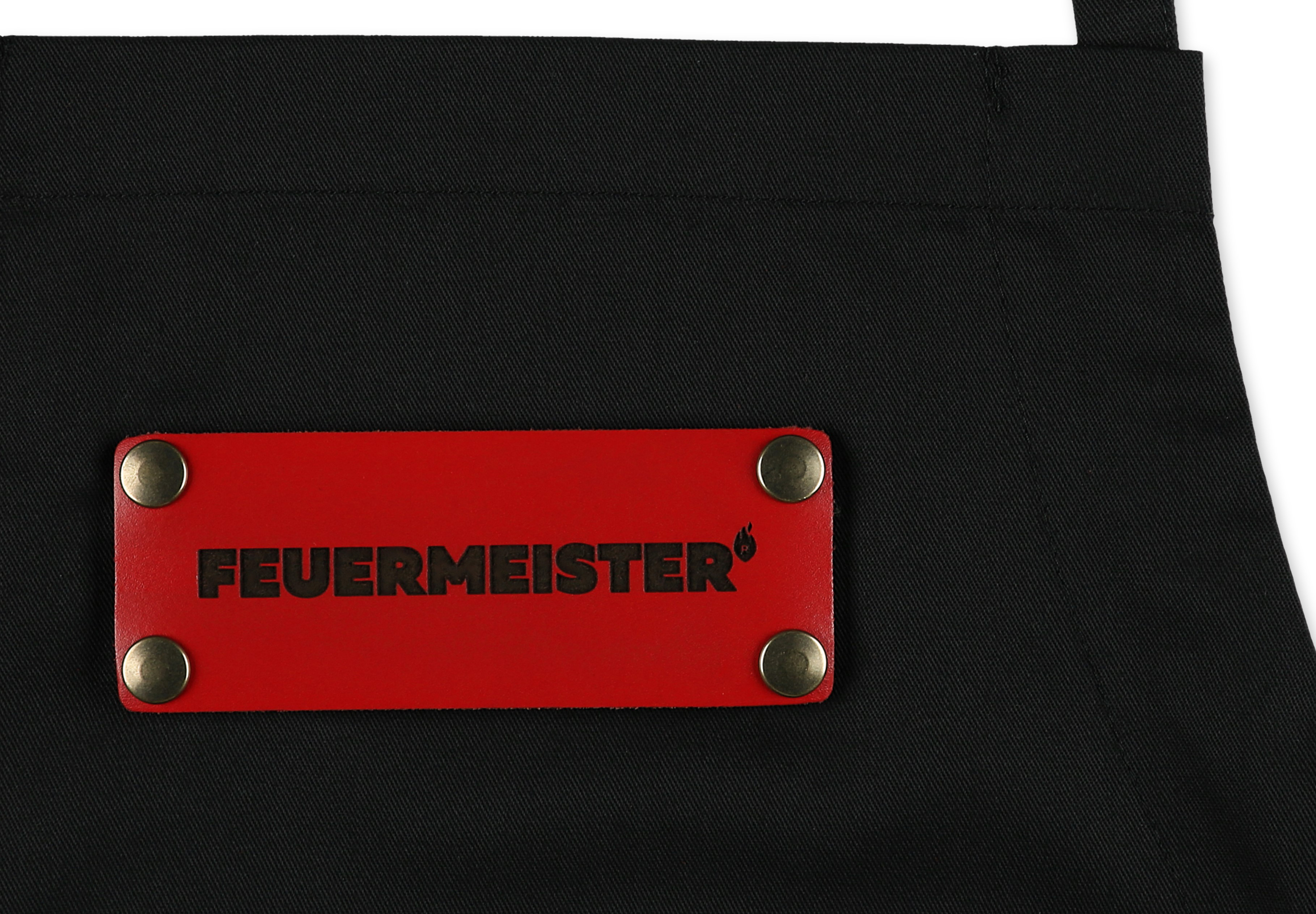  Feuermeister® Textil Schürze | schwarz | mit personalisiertem Lederemblem